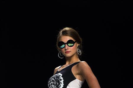 A model presents a creation from the Desigual Spring/Summer 2014 collection during New York Fashion Week September 5, 2013. REUTERS/Eric Thayer