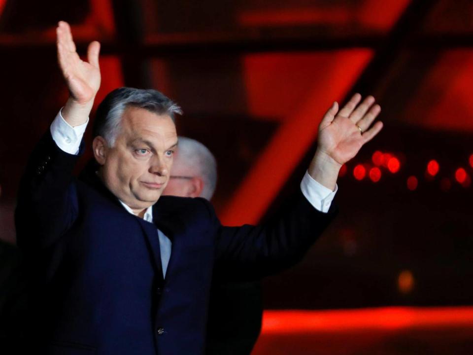 Hungarian prime minister Viktor Orban addresses supporters after declaring victory in the country’s parliamentary elections (Reuters)