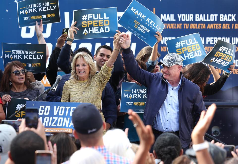 First Lady Jill Biden cheers with Democratic senate candidate Senator Mark Kelly at a campaign event in Arizona (Getty Images)