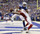 <p>Arizona Cardinals’ Larry Fitzgerald (11) tries to make a catch while being defended by Indianapolis Colts’ Rashaan Melvin during the first half of an NFL football game Sunday, Sept. 17, 2017, in Indianapolis. The pass was incomplete. (AP Photo/AJ Mast) </p>