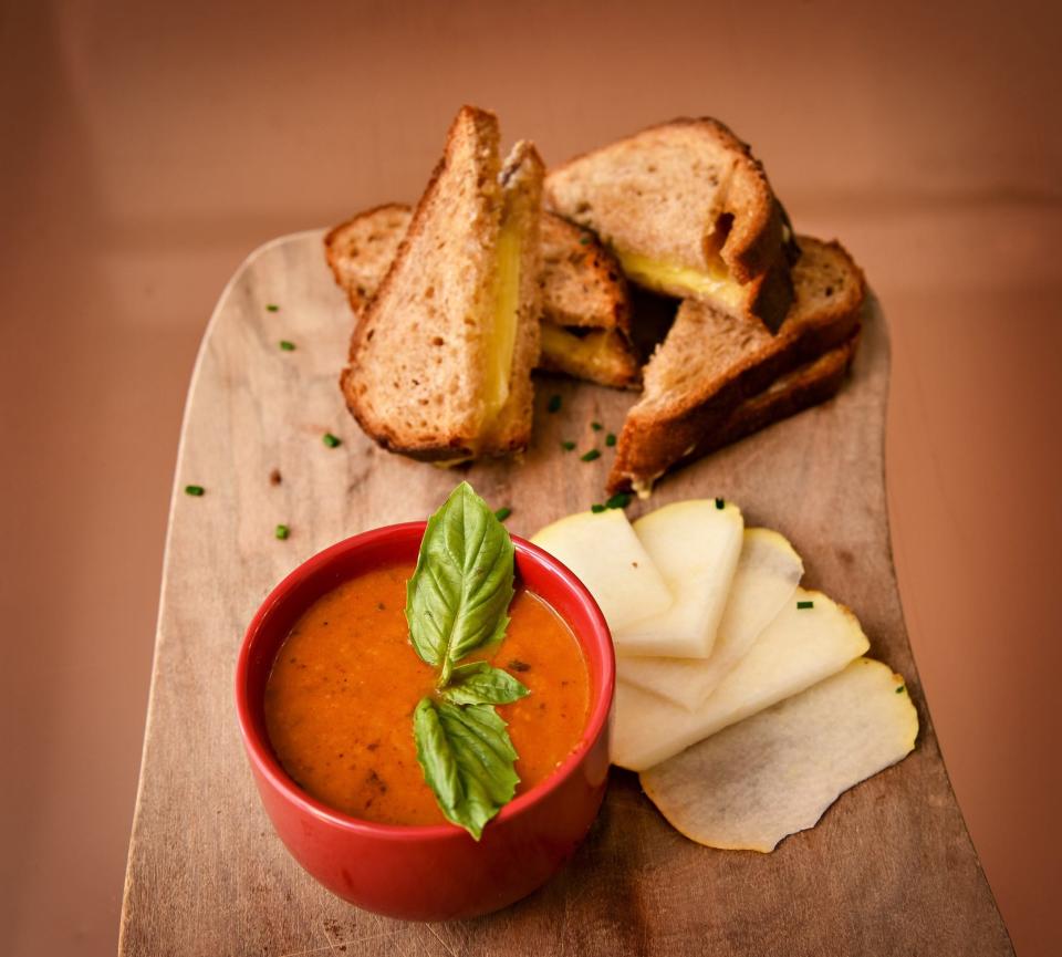 Artisan Grilled Cheese with Tomato Basil Bisque at The Champagnery in Louisville.