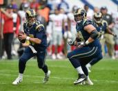 Oct 23, 2016; London, United Kingdom; Los Angeles Rams quarterback Case Keenum (17) of the recovers a fumble and looks downfield to pass against the New York Giants during the second quarter of the game at Twickenham Stadium. Mandatory Credit: Steve Flynn-USA TODAY Sports