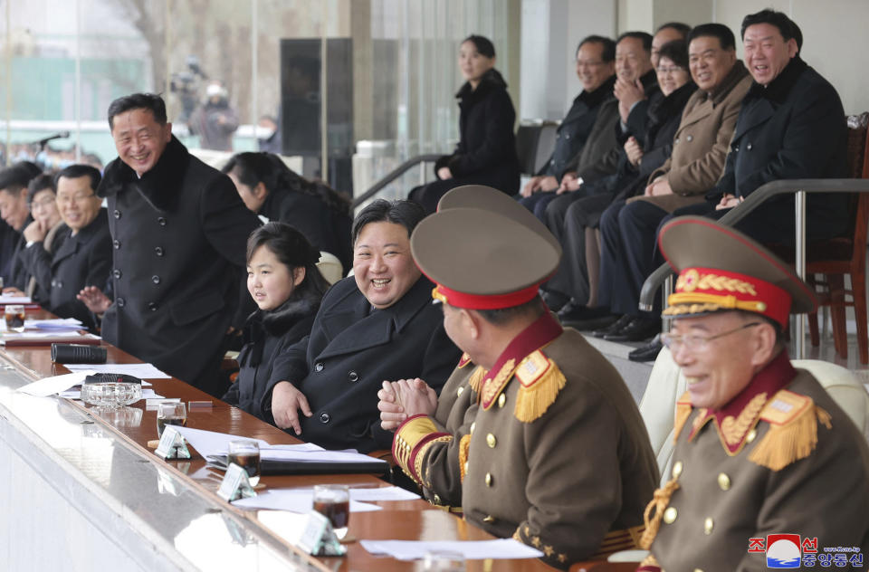 This photo provided by the North Korean government shows North Korean leader Kim Jong Un, center, and his daughter, center left, attend a soccer game celebrating the birthday of his late father at an undisclosed location in North Korea, on Feb. 17, 2023. Independent journalists were not given access to cover the event depicted in this image distributed by the North Korean government. The content of this image is as provided and cannot be independently verified. Korean language watermark on image as provided by source reads: "KCNA" which is the abbreviation for Korean Central News Agency. (Korean Central News Agency/Korea News Service via AP)