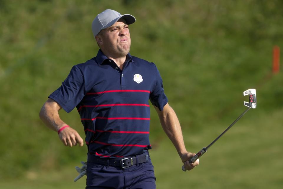 Team USA's Justin Thomas reacts to his birdie putt during a four-ball match the Ryder Cup at the Whistling Straits Golf Course Friday, Sept. 24, 2021, in Sheboygan, Wis. (AP Photo/Charlie Neibergall)