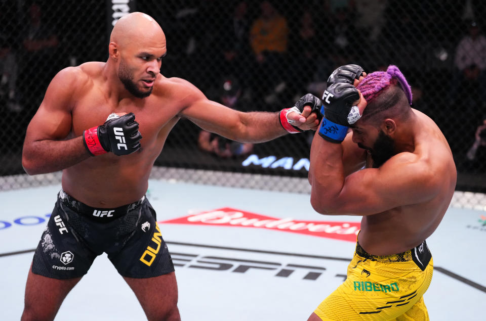 LAS VEGAS, NEVADA – MARCH 02: (L-R) Christian Leroy Duncan of England punches Claudio Ribeiro of Brazil in a middleweight bout during the UFC Fight Night event at UFC APEX on March 02, 2024 in Las Vegas, Nevada. (Photo by Jeff Bottari/Zuffa LLC via Getty Images)