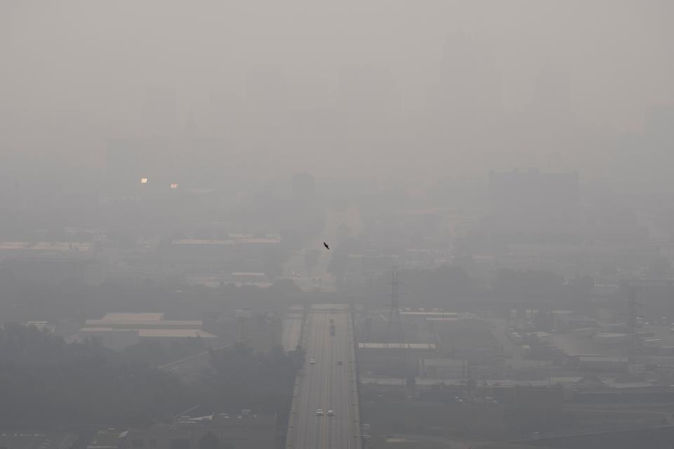 A view of haze from wildfire smoke over the 8th street viaduct heading into downtown Cincinnati on Wednesday, June 28, 2023. An air quality warning for Cincinnati was issued by the National Weather Service for Wednesday. 