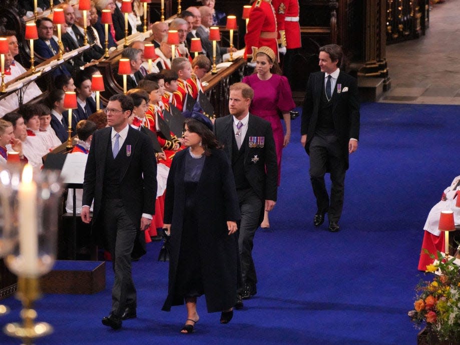 Princess Eugenie and Jack Brooksbank (front), Harry, Duke of Sussex (C) and Princess Beatrice and Edoardo Mapelli Mozzi arrive to attend the Coronation of King Charles III and Queen Camilla on May 6, 2023 in London, England.