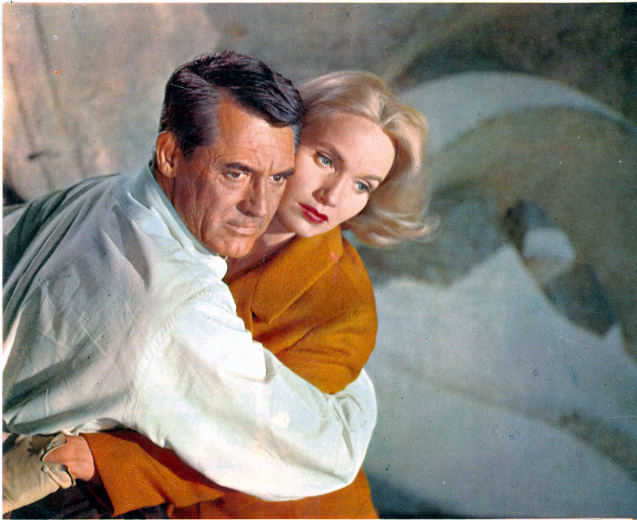 Cary Grant holding Eva Marie Saint in a scene from the film 'North By Northwest', 1959. (Photo by Metro-Goldwyn-Mayer/Getty Images)