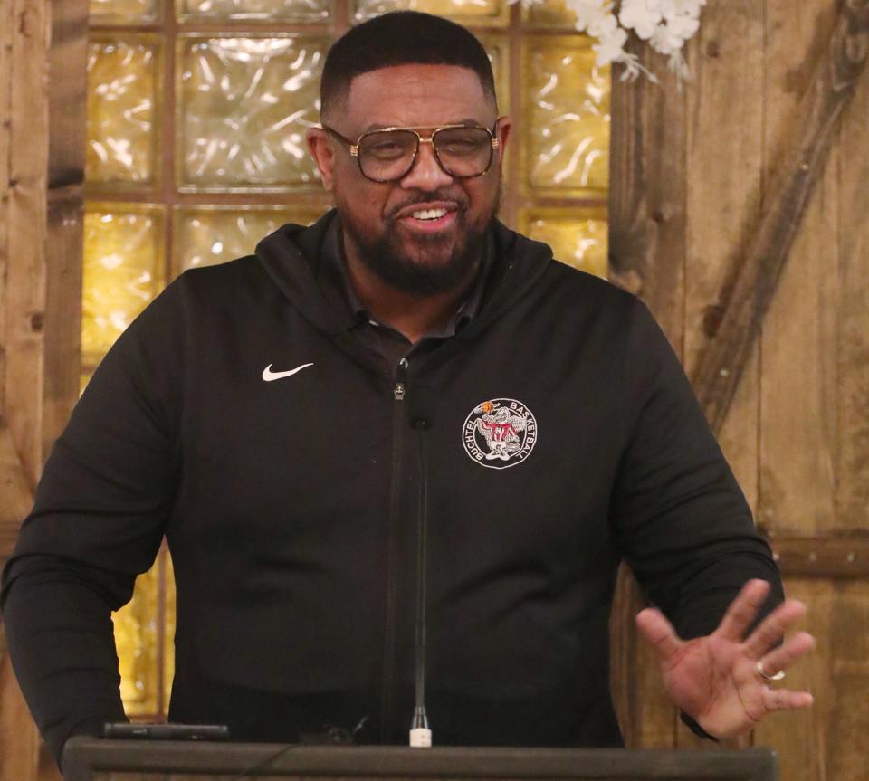 Buchtel boys basketball coach Rayshon Dent speaks at the 2022-23 Akron Public Schools City Series Basketball Media Day at Guy's Party Center.