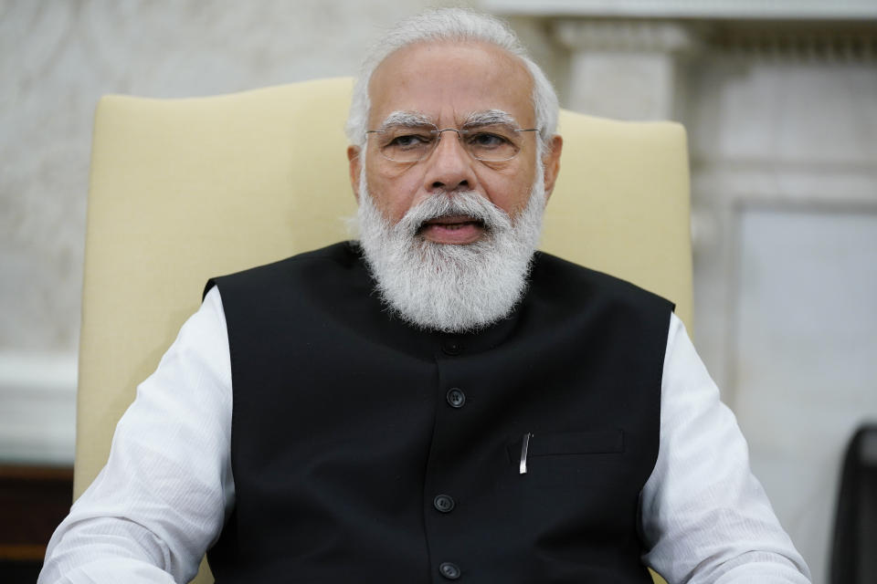 President Joe Biden meets with Indian Prime Minister Narendra Modi in the Oval Office of the White House, Friday, Sept. 24, 2021, in Washington. (AP Photo/Evan Vucci)