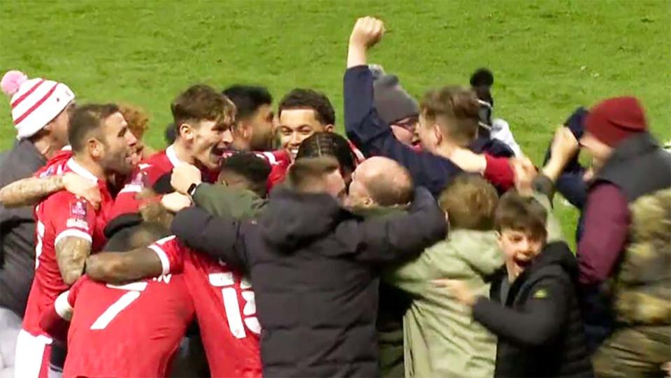 Nottingham Forest (pictured) celebrate a goal with their fans against Arsenal in the FA Cup. (Images: ESPN)