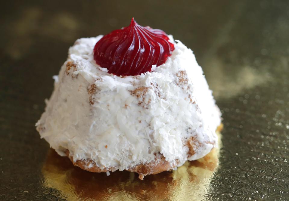 Florecitas, pastries filled with strawberry jam, covered with butter cream and coconut, are available at La Rosa Bakery in Green Bay, Wis.