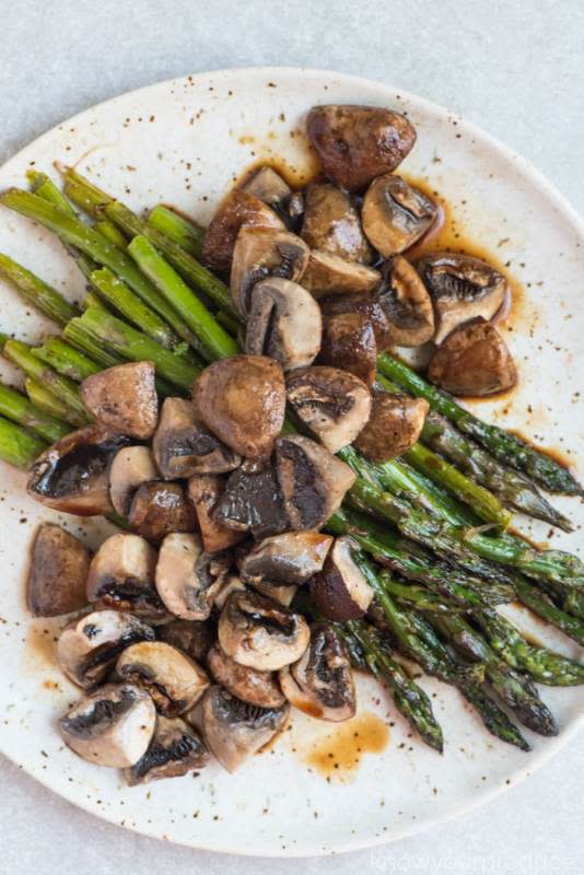 <p>Know Your Produce</p><p>It only takes a few simple ingredients to pack this healthy side dish full of flavor. </p><p><strong>Get the recipe: <a href="https://www.knowyourproduce.com/roasted-asparagus-and-mushrooms-and-balsamic-vinegar/" rel="nofollow noopener" target="_blank" data-ylk="slk:Roasted Asparagus and Mushrooms with Balsamic Vinegar;elm:context_link;itc:0;sec:content-canvas" class="link rapid-noclick-resp">Roasted Asparagus and Mushrooms with Balsamic Vinegar</a></strong></p>