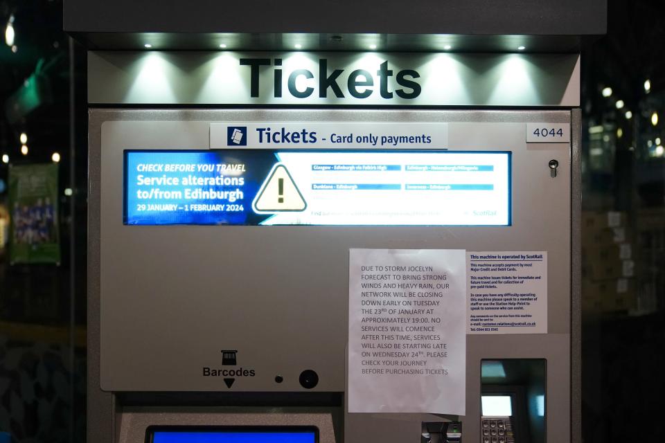 A sign on a ticket machine at Edinburgh Waverley train station as rail services to and from Scotland have been suspended until at least noon on Wednesday (PA)