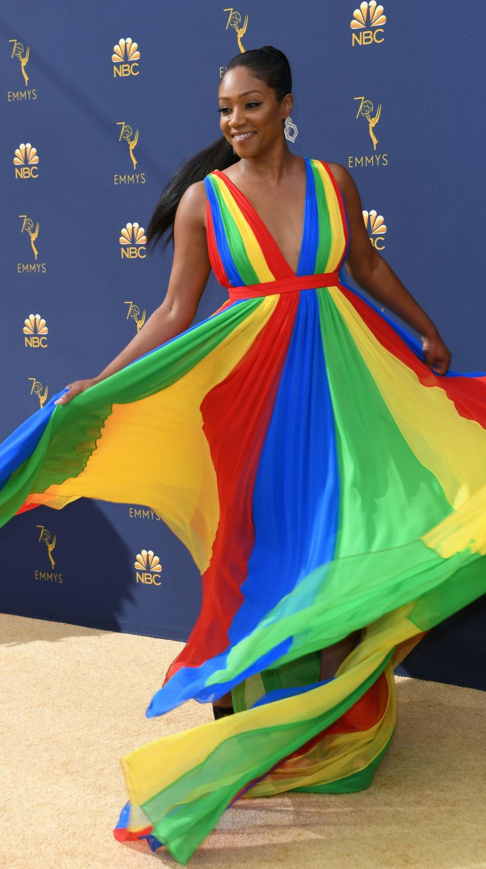 Haddish having a blast on the Emmy red carpet. (Photo: VALERIE MACON / Getty Images)