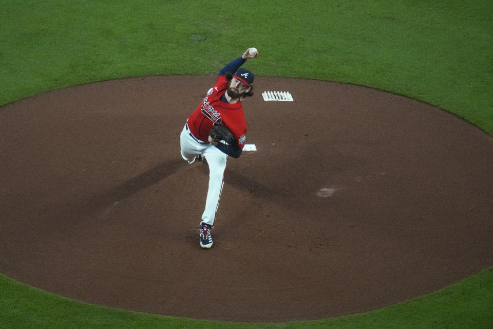 Atlanta Braves starting pitcher Ian Anderson throws during the first inning in Game 3 of baseball's World Series between the Houston Astros and the Atlanta Braves Friday, Oct. 29, 2021, in Atlanta. (AP Photo/Ashley Landis)