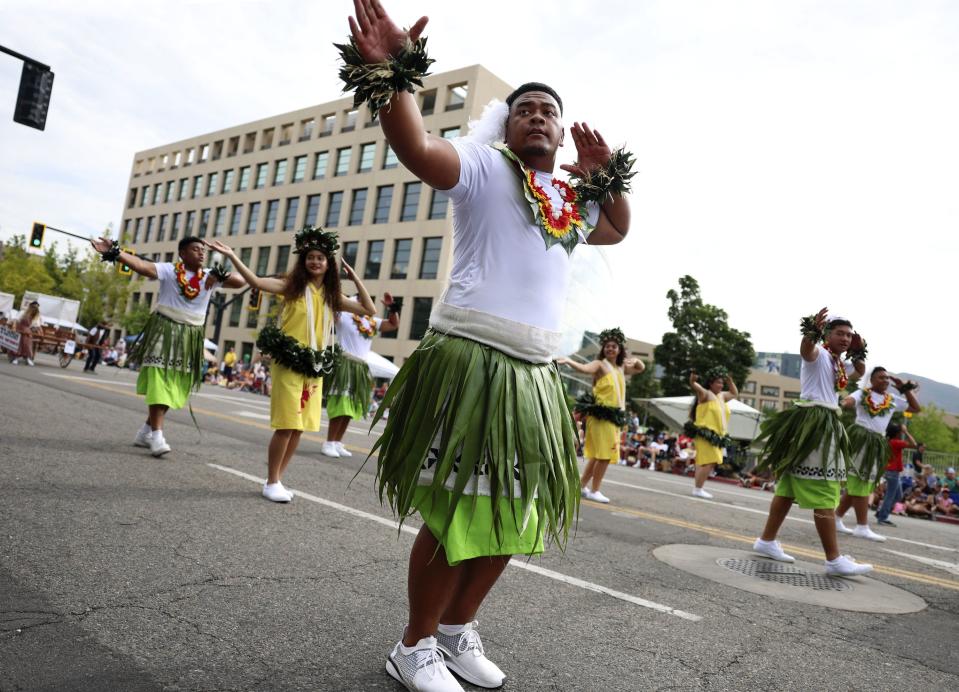 Members of the Salt Lake Utah (Tongan) West Stake walk in the Days of ‘47 Parade in Salt Lake City on Monday, July 24, 2023. The float won three awards: Children’s Choice award, People’s Choice award and the Days ’47 Sweepstakes award. | Laura Seitz, Deseret News