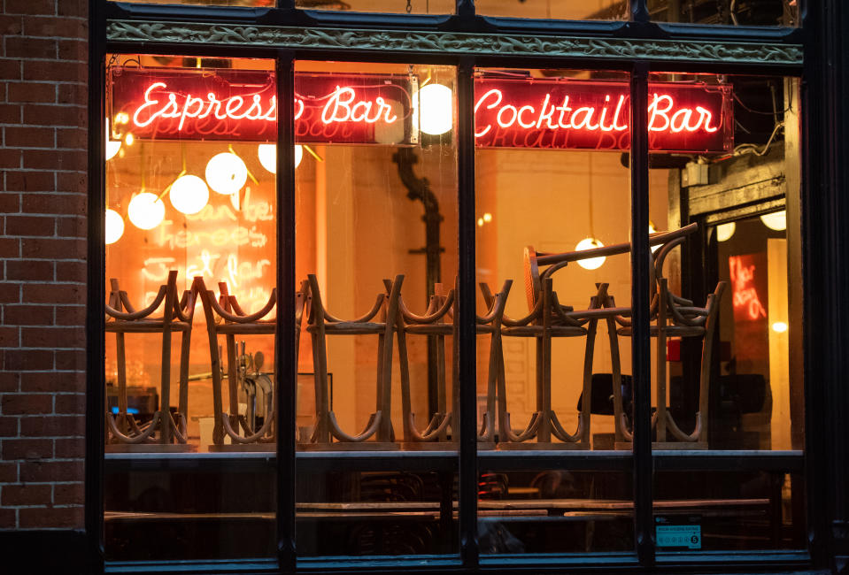 Stools up on a table top at a cocktail bar in Covent Garden, London, on the first day after the city was put into Tier 2 restrictions to curb the spread of coronavirus. (Photo by Dominic Lipinski/PA Images via Getty Images)