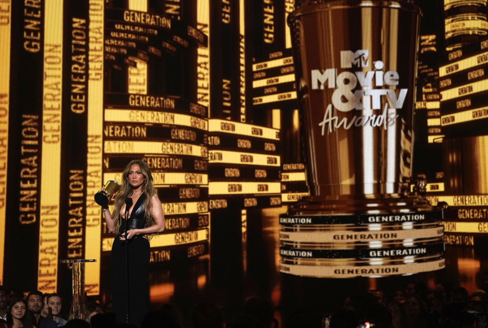 Jennifer Lopez accepts the generation award at the MTV Movie and TV Awards on Sunday, June 5, 2022, at the Barker Hangar in Santa Monica, Calif. (AP Photo/Chris Pizzello)