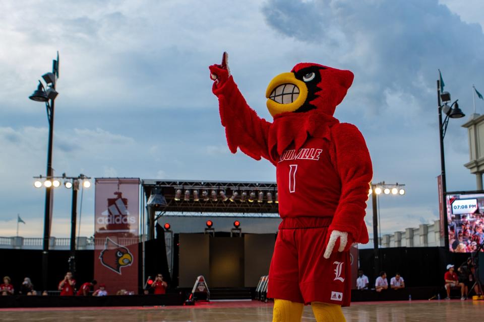 Louie the Cardinal mascot hypes up the crowd during the Louisville Live Hoops event at Churchill Downs on Saturday evening. Sept. 18, 2021