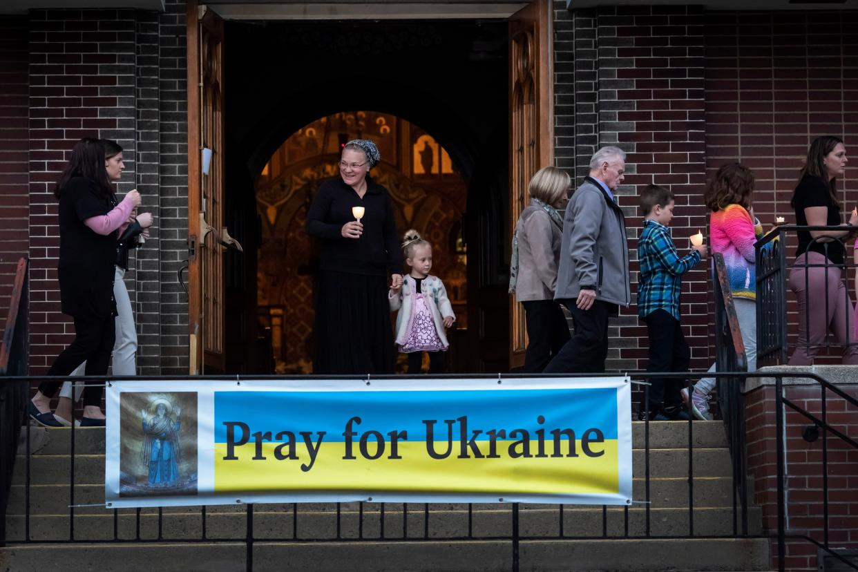 Parishioners walk in procession Friday at St. Mary's Ukrainian Orthodox Cathedral in Allentown, Pa. 