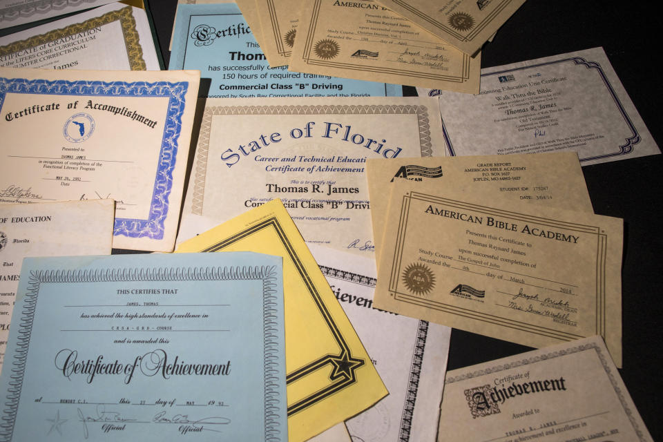 Diplomas belonging to Thomas Raynard James earned while in prison layoff a table at his home in Miami, Florida United States, June 24, 2022. (Saul Martinez / Saul Martinez for NBC News)
