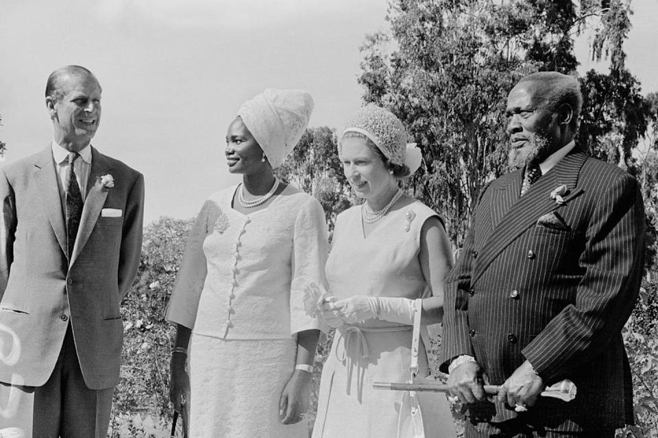 Mama Ngina Kenyatta (second left) and Jomo Kenyatta (right) host Queen Elizabeth II and Prince Philip, Duke of Edinburgh, during a visit to Kenya in 1972. (Photo by William Lovelace/Daily Express/Hulton Archive/Getty Images) GettyImages