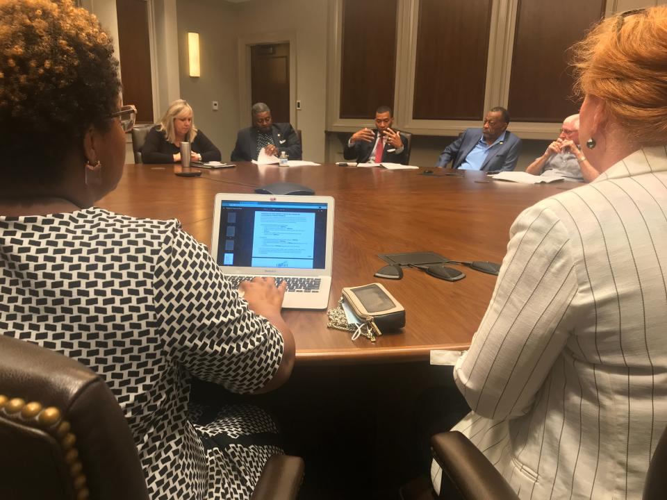 Levitate Legal & Consulting attorneys Terri Reynolds, left, and Susan Kennedy listen as Montgomery city and county leaders ask questions during a 2021 meeting about federal grant funds.