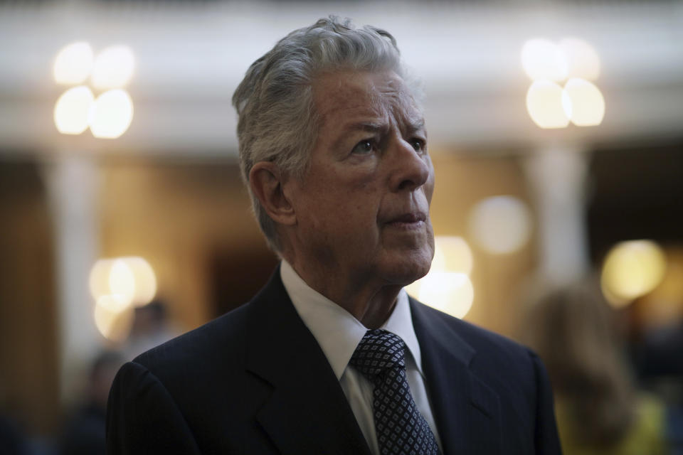 FILE - Former Governor of New Jersey, Jim Florio, stands in the Assembly chamber of the Statehouse during an event Tuesday, March 13, 2018, in Trenton, N.J. Florio, who narrowly lost his re-election bid in 1993 died Sunday, Sept. 25, 2022. He was 85. His law partner Doug Steinhardt and current Gov. Phil Murphy confirmed Florio died in statements on Monday. (AP Photo/Mel Evans, File)