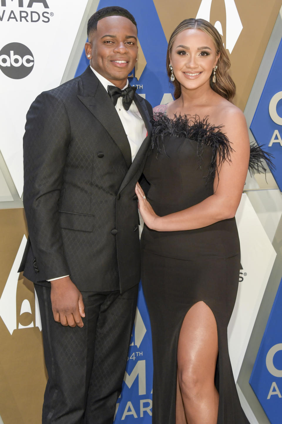 <p>The country singer and his fiancée said "I do" on May 27 at <a href="http://www.thelhi.com/" rel="nofollow noopener" target="_blank" data-ylk="slk:The Lake House Inn;elm:context_link;itc:0;sec:content-canvas" class="link ">The Lake House Inn</a> in Perkasie, Pennsylvania, <a href="https://people.com/country/jimmie-allen-marries-alexis-gale/" rel="nofollow noopener" target="_blank" data-ylk="slk:PEOPLE confirmed;elm:context_link;itc:0;sec:content-canvas" class="link ">PEOPLE confirmed</a>.</p> <p>The "Best Shot" crooner, 34, and Gale, a nurse, celebrated their nuptials with family and friends, including fellow country singer-songwriters <a href="https://people.com/tag/darius-rucker/" rel="nofollow noopener" target="_blank" data-ylk="slk:Darius Rucker;elm:context_link;itc:0;sec:content-canvas" class="link ">Darius Rucker</a>, <a href="https://people.com/country/tyler-rich-sabina-gadecki-wedding-photos/" rel="nofollow noopener" target="_blank" data-ylk="slk:Tyler Rich;elm:context_link;itc:0;sec:content-canvas" class="link ">Tyler Rich</a> and wife <a href="https://people.com/country/tyler-rich-sabina-gadecki-brother-brain-cancer-diagnosis/" rel="nofollow noopener" target="_blank" data-ylk="slk:Sabina Gadecki;elm:context_link;itc:0;sec:content-canvas" class="link ">Sabina Gadecki</a>, and <a href="https://people.com/tag/chuck-wicks/" rel="nofollow noopener" target="_blank" data-ylk="slk:Chuck Wicks;elm:context_link;itc:0;sec:content-canvas" class="link ">Chuck Wicks</a> and wife <a href="https://people.com/parents/chuck-wicks-male-infertility-wife-kasi-pregnant-son-exclusive/" rel="nofollow noopener" target="_blank" data-ylk="slk:Kasi;elm:context_link;itc:0;sec:content-canvas" class="link ">Kasi</a>.</p> <p>The newlyweds are parents to <a href="https://people.com/parents/jimmie-allen-welcomes-daughter-naomi-betty-alexis-gale/" rel="nofollow noopener" target="_blank" data-ylk="slk:daughter Naomi Bettie;elm:context_link;itc:0;sec:content-canvas" class="link ">daughter Naomi Bettie</a>, 14 months, as well as Aadyn, Allen's 7-year-old son from a previous relationship. Their wedding was previously set for last year, and later postponed due to the pandemic. </p>