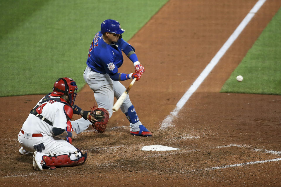 Chicago Cubs' Javier Baez hits a two-run home run during the first inning of a baseball game against the St. Louis Cardinals, Sunday, May 23, 2021, in St. Louis. (AP Photo/Scott Kane)