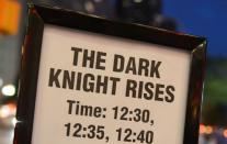 A signboard outside a Midnight Premiere showing of the "The Dark Knight Rises" on Thursday. At least 10 people were killed and several wounded early Friday when two gunmen wearing gas masks and body armor opened fire at a crowded cinema premiere in the US city of Aurora, media reported