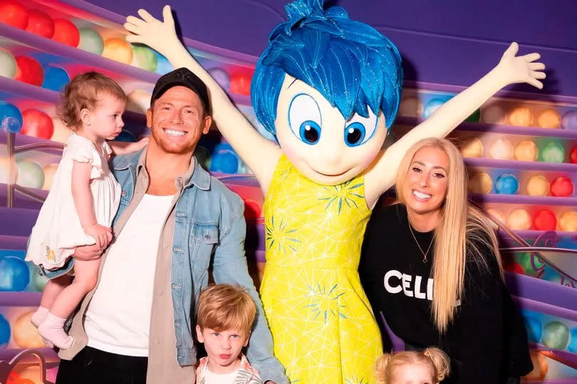 Stacey, Joe Swash and family pictured attending the Pixar Party at Disney Store Oxford Street in May 2022