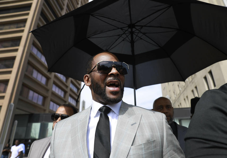 FILE - In this Thursday, June 6, 2019, file photo, musician R. Kelly leaves the Leighton Criminal Court building, in Chicago. Kelly is due in a New York City court, Friday, Aug. 2, 2019, for an arraignment on charges he sexually abused women and girls. (AP Photo/Amr Alfiky, File)