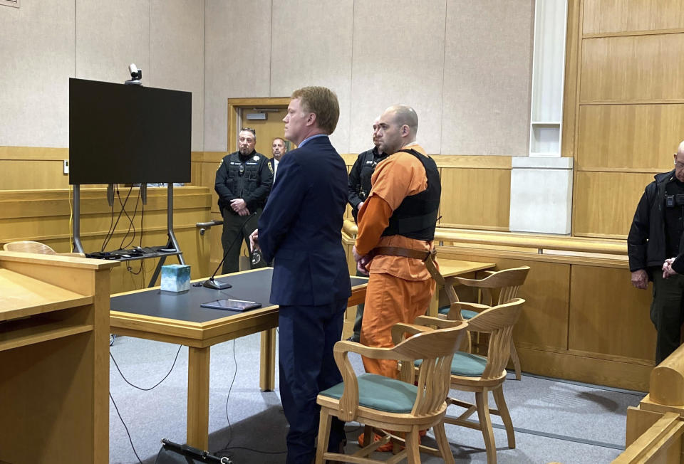 Joseph Eaton, the suspect in a shooting spree in Maine, appears in court in West Bath, Maine, Thursday, April 20, 2023. Police say Eaton confessed to shooting seven people, killing four of them, including his parents. (AP Photo/Patrick Whittle)