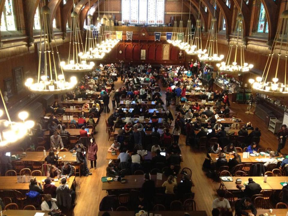 Students gather in the Annenberg Hall after being evacuated from campus buildings, after unconfirmed reports that explosives had been planted at Harvard University in Cambridge