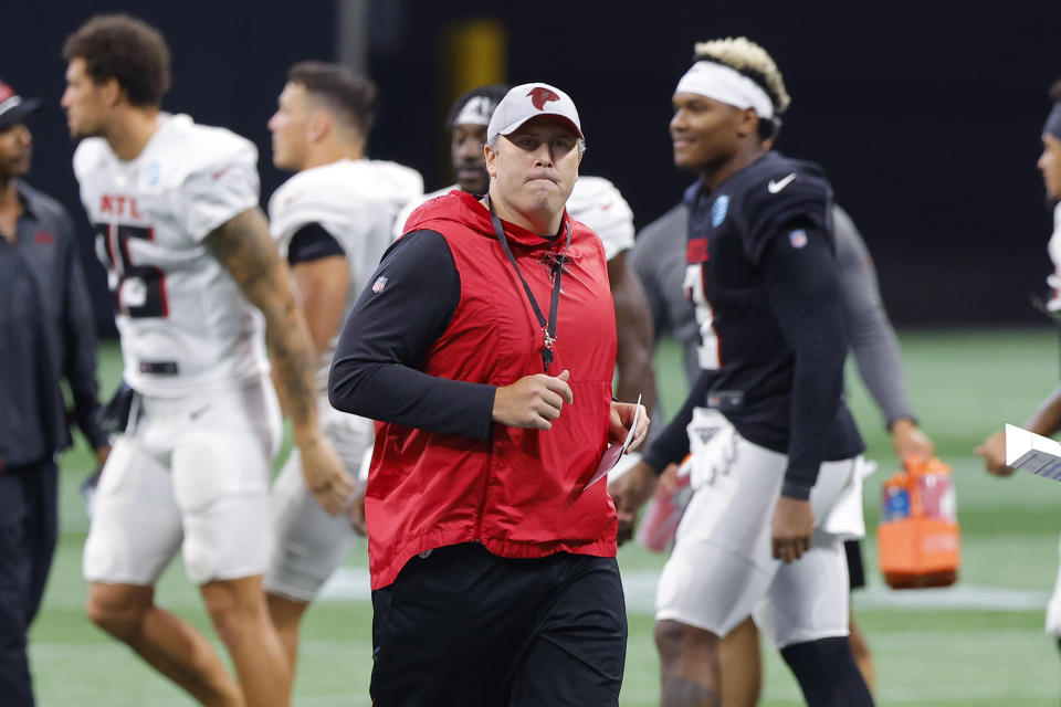 Atlanta Falcons coach Arthur Smith walks the field during the NFL football team's open practice in Atlanta on Monday, Aug. 15, 2022. (AP Photo/Todd Kirkland)