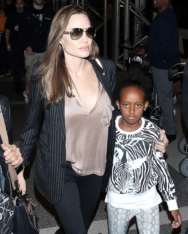 Angelina Jolie and daughters Shiloh and Zahara at LAX in