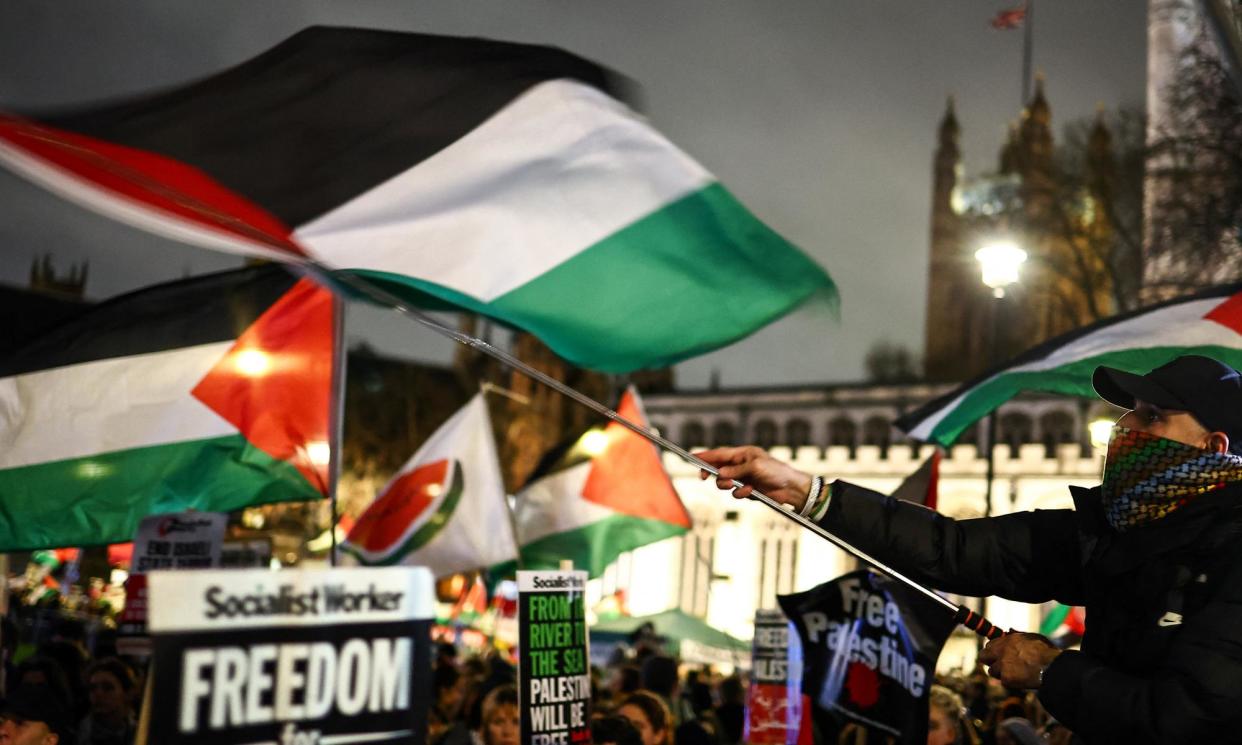 <span>Organisers of pro-Palestinian marches say a false narrative is being created, but people have been arrested for showing or saying antisemitic slogans on the protests.</span><span>Photograph: Henry Nicholls/AFP/Getty Images</span>