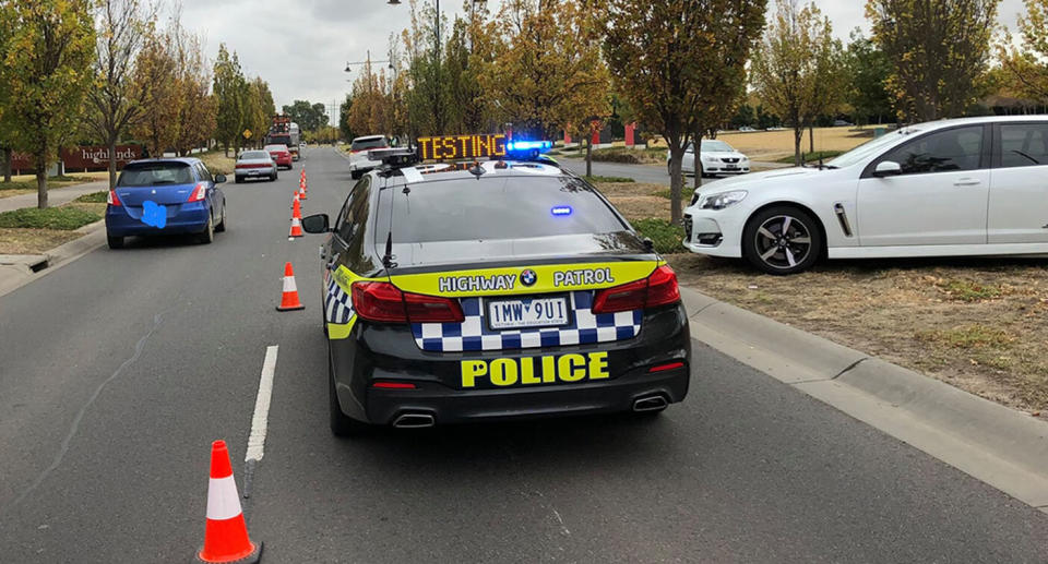 A car with two young children unrestrained inside was stopped by police in Melbourne.