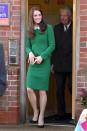 <p>The Duchess of Cambridge wears a green tweed skirt suit by Hobbs, black suede pumps by Gianvito Rossi and a black clutch while visiting East Anglia's Children's Hospice in Norfolk, England.</p>