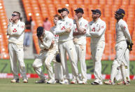 England's Dominic Bess, left, and teammates react after losing the review for the wicket of India's Rishabh Pant during the second day of fourth cricket test match between India and England at Narendra Modi Stadium in Ahmedabad, India, Friday, March 5, 2021. (AP Photo/Aijaz Rahi)