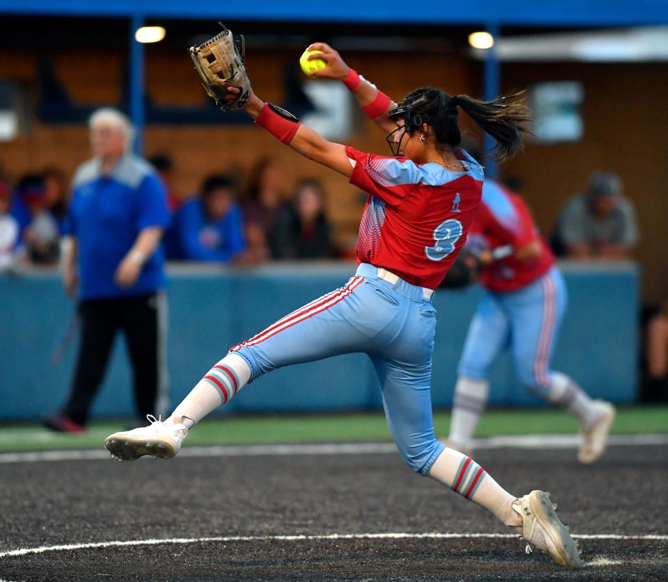 Lubbock Monterey pitcher Anays Perez winds up to send the ball over the plate against Cooper. Perez tossed a two-hitter and struck out 16 in nine innings.