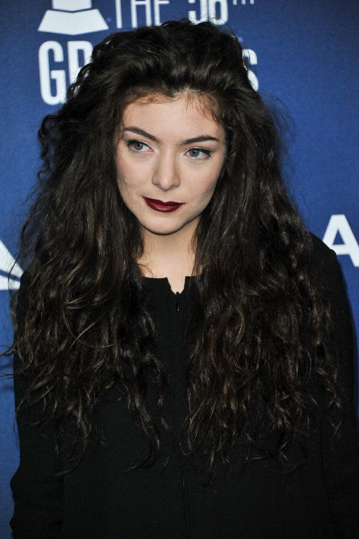 Lorde arrives at the Delta Airlines kick Off Grammy Weekend with a Private Performance, on Thursday, January. 23, 2014, in West Hollywood, Calif. (Photo by Richard Shotwell Invision/AP)