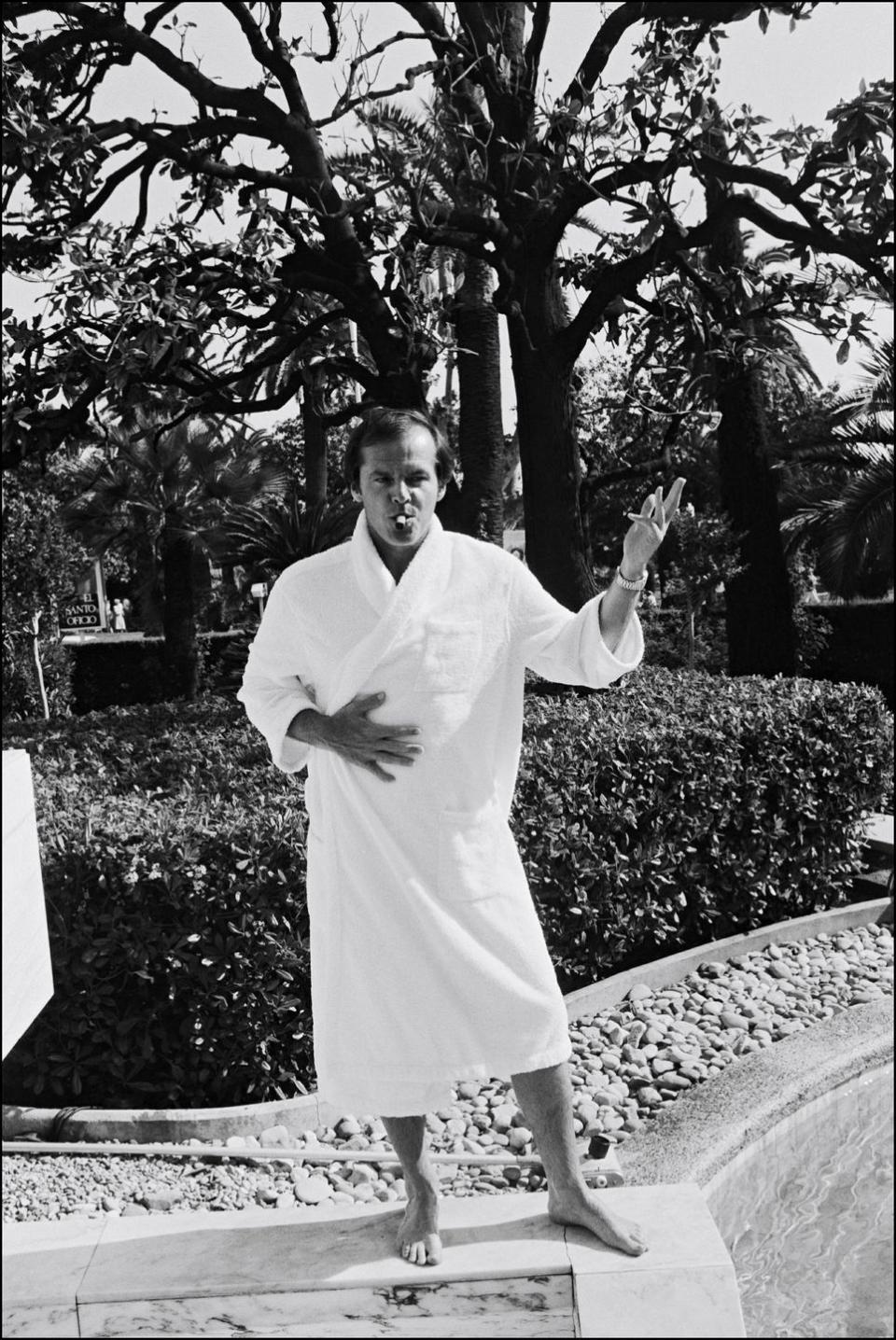 <p>Jack Nicholson finds a moment to himself to enjoy a swim and a cigar at the International Film Festival in Cannes in 1974. </p>