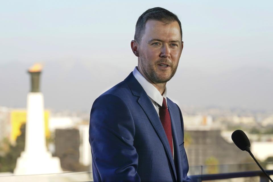 New USC football coach Lincoln Riley speaks during an introductory ceremony.