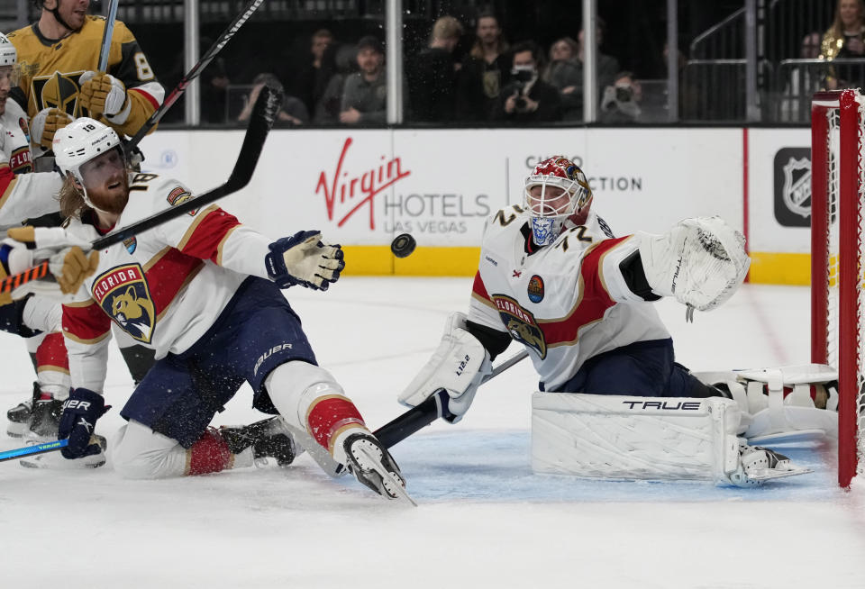 Florida Panthers defenseman Marc Staal (18) and Florida Panthers goaltender Sergei Bobrovsky (72) dive for a puck against the Vegas Golden Knights during the second period of an NHL hockey game Thursday, Jan. 12, 2023, in Las Vegas. (AP Photo/John Locher)