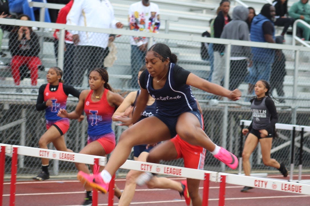 Whetstone's Karleighiah Jenkins competes in the 100-meter hurdles in the City League track and field meet Thursday at Africentric. Jenkins won the race (17:15), helping the Braves earn their second consecutive league title.