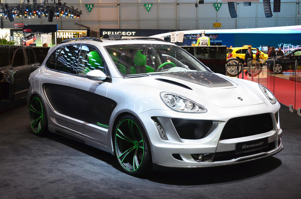 <b>Gemballa Tornado</b><p><br>Another monstrous Cayenne customisation is the Gemballa Tornado. Most things about it, from the part-green seats and steering wheel to the green and black two-tone wheels and the black side panels is just awful. Even the choice of green is a bad one. At least the body kit could be worse.</p>