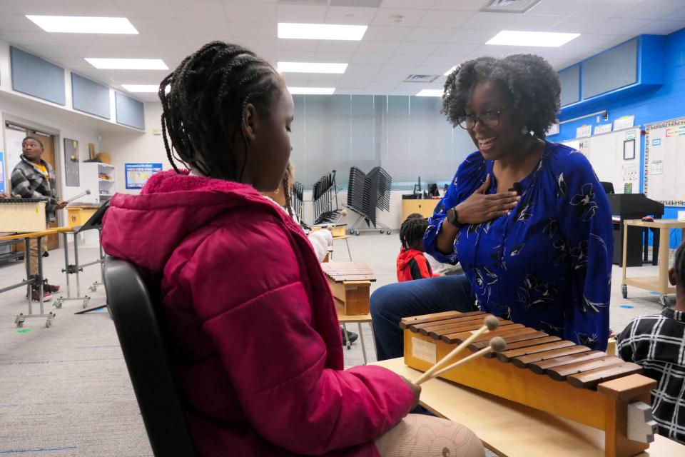 A picture of Dwynette Smith, Alachua County's 2024 Teacher of the Year, with a student.